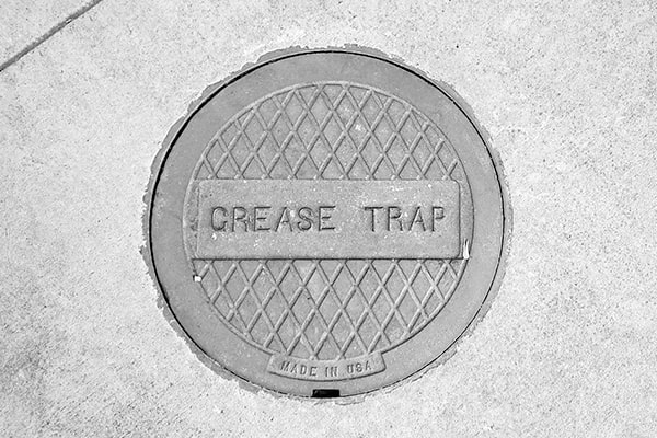neglecting grease trap pumping can lead to clogs, backups, and costly repairs